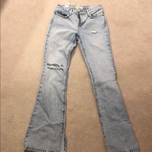 High waisted distressed flare jean